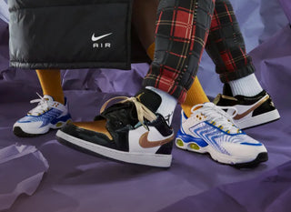 A group of kids showing off their latest Nike footwear