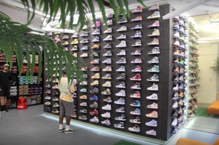 The interior of the store, featuring a wall full of Jordan 1 from the floor to the ceilling